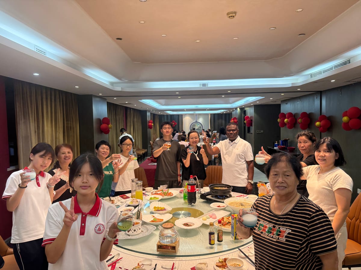 HLK colleagues, their families and two visiting clients from Ghana raising a toast at the Mid-Autumn banquet in Quanzhou